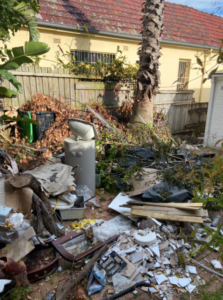 tenant left rubbish behind - yard